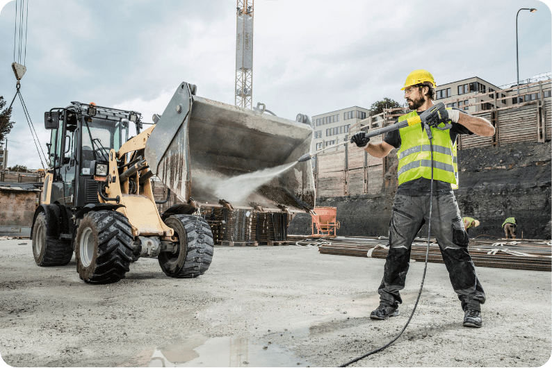 A Class 10 industrial pressure washer used by a man.